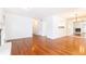 Bright and spacious living room with hardwood floors, connecting to the kitchen and featuring a fireplace at 2901 Lenox Ne Way # 902, Atlanta, GA 30324