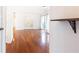 Open living area with gleaming hardwood floors and access to a patio at 2901 Lenox Ne Way # 902, Atlanta, GA 30324