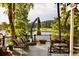 Outdoor deck offers a peaceful retreat with seating, views of the golf course and lake at 3800 Schooner Rdg, Alpharetta, GA 30005