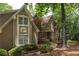 Charming exterior with manicured landscaping, stone accents, and well-placed windows offering ample natural light at 3800 Schooner Rdg, Alpharetta, GA 30005