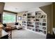 Cozy home office with built-in shelving, offering a perfect reading nook at 3800 Schooner Rdg, Alpharetta, GA 30005