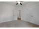 Bedroom featuring closet and neutral walls with carpeted floors and ceiling fan at 1687 Harmony Rd, Temple, GA 30179