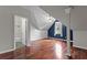 Bedroom features vaulted ceilings, wood floors, and an ensuite bathroom with great natural light at 2990 Hearthstone Dr, Cumming, GA 30041