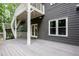 A spacious outdoor deck offers plenty of room for seating and entertaining with convenient access to the home at 2990 Hearthstone Dr, Cumming, GA 30041