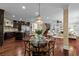 Spacious open-concept layout with the kitchen, dining area, and living room seamlessly connected at 2990 Hearthstone Dr, Cumming, GA 30041