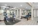 Basement featuring exercise equipment, mirrors, and neutral-colored walls at 3663 Essex Ave # 29, Atlanta, GA 30339
