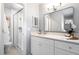 Bright bathroom featuring a glass-enclosed shower and modern vanity at 3663 Essex Ave # 29, Atlanta, GA 30339