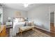 Comfortable bedroom featuring a queen size bed with decorative pillows at 3663 Essex Ave # 29, Atlanta, GA 30339