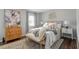 Comfortable bedroom featuring a queen size bed with decorative pillows at 3663 Essex Ave # 29, Atlanta, GA 30339