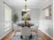 Cozy dining room features modern decor, a round table with four chairs and a window with natural light at 3663 Essex Ave # 29, Atlanta, GA 30339