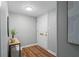 Inviting entryway with wood floors, a white front door, and modern decor creating a warm welcome at 3663 Essex Ave # 29, Atlanta, GA 30339