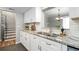 Kitchen featuring stainless appliances, granite counters, and stairs nearby at 3663 Essex Ave # 29, Atlanta, GA 30339