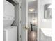 Convenient laundry area with stacked washer and dryer located off the bathroom at 3663 Essex Ave # 29, Atlanta, GA 30339