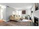 Cozy living room with neutral decor, fireplace, and decorative rug at 3663 Essex Ave # 29, Atlanta, GA 30339