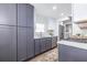 Well-equipped kitchen features stainless steel appliances, modern cabinets, and ample counter space for easy meal preparation at 75 Mayson Ne Ave, Atlanta, GA 30307