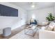 Cozy living room with sleek furniture, chic decor, and stylish lighting; an inviting space for relaxation at 75 Mayson Ne Ave, Atlanta, GA 30307
