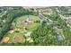 Aerial view of baseball fields and tennis courts, close to the neighborhood at 10830 Carrara Cv, Alpharetta, GA 30022