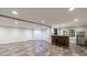 Finished basement featuring a stylish bar, and recessed lighting at 10830 Carrara Cv, Alpharetta, GA 30022