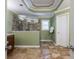 Spacious bathroom featuring a walk-in shower, tiled floors, and modern fixtures at 10830 Carrara Cv, Alpharetta, GA 30022