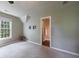 Bedroom featuring a window for natural light with an en-suite bathroom at 10830 Carrara Cv, Alpharetta, GA 30022