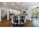 Kitchen with granite countertops, stainless steel appliances, and a view to the Gathering room at 10830 Carrara Cv, Alpharetta, GA 30022