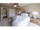 Main bedroom with neutral tones and with large closet with double doors at 10830 Carrara Cv, Alpharetta, GA 30022