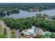 Aerial view of the community swimming pool, splash pad, and picnic area by the lake at 110 Westchester Way, Alpharetta, GA 30005