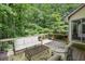 Outdoor deck with comfortable seating, perfect for relaxing and entertaining at 110 Westchester Way, Alpharetta, GA 30005