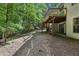 A spacious backyard with a wooden deck, perfect for outdoor entertaining and relaxation at 110 Westchester Way, Alpharetta, GA 30005