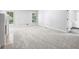 Bedroom with large windows, light-colored carpet, and an ensuite bathroom at 110 Westchester Way, Alpharetta, GA 30005