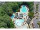 Aerial view of community pool area with multiple pools, lounging, and recreation spaces at 110 Westchester Way, Alpharetta, GA 30005
