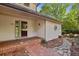 Charming front porch featuring brick flooring and stone pathway leading to a landscaped entrance at 110 Westchester Way, Alpharetta, GA 30005