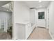 Hallway with built-in bench, storage cabinets, and access to a staircase at 110 Westchester Way, Alpharetta, GA 30005