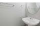 A simple, modern sink with a framed mirror above in a well lit bathroom space at 2566 Walden Lake Dr, Decatur, GA 30035