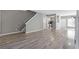Spacious living room with modern flooring and a clear view into the home's kitchen at 2566 Walden Lake Dr, Decatur, GA 30035