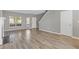 Bright living room with large windows and hardwood floors at 2566 Walden Lake Dr, Decatur, GA 30035