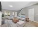 Bright living room with a fireplace, plush seating, and contemporary decor at 2566 Walden Lake Dr, Decatur, GA 30035