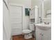 Cozy bathroom with tile flooring, a vanity sink, and a shower/tub combo at 1096 Tilden Nw St, Atlanta, GA 30318