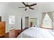 Spacious bedroom with tall ceilings, hardwood floors, and an adjoining room at 1096 Tilden Nw St, Atlanta, GA 30318