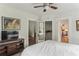 Well-lit bedroom providing access to other rooms and closet, featuring a TV and comfortable layout at 1096 Tilden Nw St, Atlanta, GA 30318