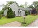 Landscaped lawn, trees, and charming mailbox enhance the curb appeal of this lovely home at 1096 Tilden Nw St, Atlanta, GA 30318