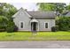 Charming one-story home with a welcoming front porch and well-maintained lawn at 1096 Tilden Nw St, Atlanta, GA 30318