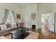 Elegant living room with hardwood floors, stylish decor, and ample natural light at 1096 Tilden Nw St, Atlanta, GA 30318