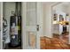 Walk-in pantry by kitchen featuring shelves and water heater at 1096 Tilden Nw St, Atlanta, GA 30318