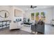 Stylish living room with a fireplace, modern furnishings, and plenty of natural light at 1721 Lansmere Sw St, Marietta, GA 30008