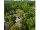 An aerial view of a well-maintained multi-Gathering home nestled amongst large mature trees at 1990 Wellbourne Dr # 5, Atlanta, GA 30324