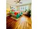 Bright bedroom with hardwood floors, a comfortable bed, and ample natural light at 1990 Wellbourne Dr # 5, Atlanta, GA 30324