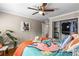 Bedroom with closet, ceiling fan, bright bedding, and hardwood floors at 1990 Wellbourne Dr # 5, Atlanta, GA 30324