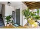 Inviting front entrance with a welcoming mat, cute decor, and a cozy, decorated outdoor space at 1990 Wellbourne Dr # 5, Atlanta, GA 30324