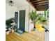 Charming front porch featuring a welcome mat, potted plants, and outdoor seating area at 1990 Wellbourne Dr # 5, Atlanta, GA 30324